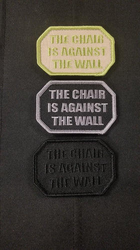 The Chair is Against the Wall Trio